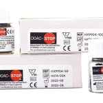 DOAC-STOP HX9904-100 Kit and bottle scattered on a white surface